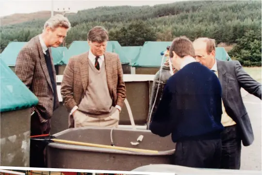  ??  ?? Above: Inspecting hatchery tanks at Inchmore Hatchery, (l-r) Ocke Muller, David MaCarthy, Dave McEwan and another Left: Processing in Chile