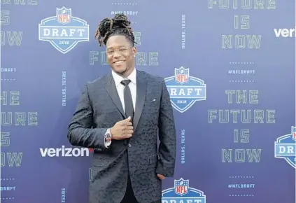  ?? ERIC GAY/ASSOCIATED PRESS ?? Former UCF star Shaquem Griffin poses on the red carpet before the first round of the NFL draft. Griffin one of 23 players invited on Thursday.
