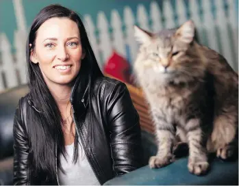  ?? GEOFF ROBINS/THE CANADIAN PRESS ?? Animal trainer Melissa Millett says she adopted rescue cat Tonic after they worked together on the remake of the film Pet Sematary, based on Stephen King’s novel.