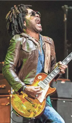  ?? SANTIAGO BLUGUERMAN­N/GETTY IMAGES ?? Lenny Kravitz performs on stage at Lollapaloo­za Buenos Aires last year.