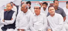  ?? PTI ?? Congress President Rahul Gandhi with party leaders Ajay Maken and Mallikarju­n Kharge during a nationwide day-long fast against caste violence, communalis­m and the non-functionin­g of Parliament at Rajghat on Monday