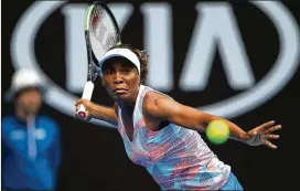  ?? CLIVE BRUNSKILL / GETTY IMAGES ?? Venus Williams hits against Belinda Bencic on the first day of the Australian Open. Williams, the fifth seed, lost to the 78th-ranked Bencic 6-3, 7-5, ending a streak of seven Grand Slams in which she reached at least the fourth round.