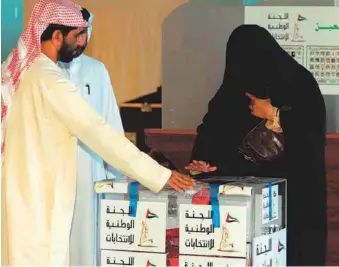  ?? Gulf News Archives ?? Landmark elections
A woman votes in Ras Al Khaimah during the December 2006 Federal National Council elections. In 2006, two years after Shaikh Khalifa took office, the FNC had its first elections when half the members were voted into office by a small electoral college.