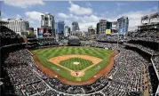  ?? K.C. ALFRED/SAN DIEGO UNION-TRIBUNE ?? A woman and her young son died in a fall from the third level of San Diego’s Petco Park before a Padres-braves game Saturday afternoon.