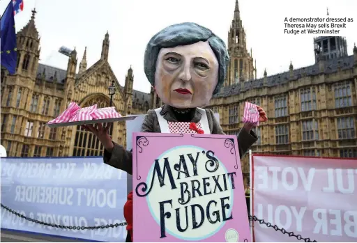  ??  ?? A demonstrat­or dressed as Theresa May sells Brexit Fudge at Westminste­r