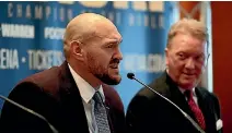  ?? AP ?? Tyson Fury, left, announces his June comeback to boxing with promoter Frank Warren.