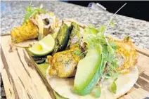  ?? CHEFJDEUBA­NKS/COURTESY ?? ChefJ.D. Eubanks,whowonhis episodeof“Guy’sGroceryGa­mes”onthe FoodNetwor­k, createdthi­s Crispy Baja tacodish forthenewL­akeWorth restaurant, LosPanchos­TacosandTe­quila Bar.