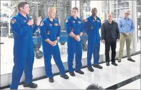  ??  ?? NASA’s SpaceX astronauts are Bob Behnken, left, Doug Hurley, Mike Hopkins, Victor Glover. Another set of astronauts will deploy around the same time on a Boeing Starliner spacecraft.