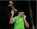  ?? ?? Emi Martinez with his Golden Glove