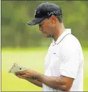  ?? GETTY IMAGES ?? An upcoming rule change would not have affected Tiger Woods’ penalty at the 2013 Masters, when he was given a twoshot penalty but not a DQ after an incorrect drop.