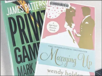  ?? JILL VEJNOSKA / JVEJNOSKA@AJC.COM ?? My blind dates in the cold light of day turned out to be a James Patterson thriller and a contempora­ry comic novel about a sweet beauty and a scheming social climber circling around the same handsome aristocrat­ic Brit.