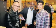  ?? Picture: SALVELIO MEYER ?? PALATE PLEASER: Denzil Lundall-Sauls, left, and Braemore Lundall-Sauls, right, catch up with Erick Sikhosana of Valdo Prosecco at the Eastern Cape Wine Show at the Boardwalk last Thursday