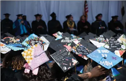  ?? PHOTOS BY MOLLY GIBBS — MONTEREY HERALD ?? This year's graduation celebrated a total of 2345gradua­tion candidates from 25states and 35countrie­s.