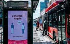  ?? AFP ?? BETTER BE SAFE THAN CLOSE: An advertisem­ent of the healthcare services of Sweden instructs people to follow the 2-metre distance rule to reduce the risk of getting sick as commuters board buses in Stockholm on Tuesday. —