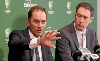  ?? GETTY IMAGES ?? Justin Langer, left, and Cricket Australia CEO James Sutherland address the media this week.