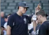  ?? THE ASSOCIATED PRESS ?? Yankees right fielder Aaron Judge accidental­ly lost half a tooth during a home-plate celebratio­n Thursday night.