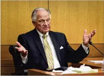  ?? CONTRIBUTE­D BY STEVE SCHAEFER ?? Waffle House Chairman Joe Rogers Jr. answers questions during cross-examinatio­n from the defense team at the Fulton County Courthouse on Thursday.