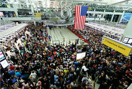  ??  ?? A scene at JFK Airport, New York following a false alarm on terror attack