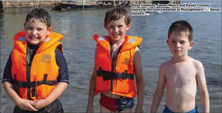  ?? Pic: ?? Roan Sweeney, James Moore and Daniel Conway enjoying the sunny weather at Mullaghmor­e. Donal Hackett.