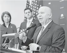  ?? J. Scott Applewhite / Associated Press file ?? Brady, R-The Woodlands, and House Speaker Paul Ryan, center, envision a massive overhaul of the tax code, including a border adjustment tax to offset cuts. That proposal has come under fire from Democrats as well as members of their own party.