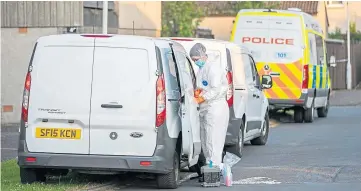  ?? ?? Police in Glenrothes after the attack on Scott Napier last July. Picture by Kim Cessford.