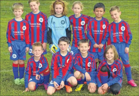  ?? Picture: Bob Kitchin FM4009738 Buy this picture from kentonline.co.uk ?? MPE Sports under-9s have the right balance between winning and participat­ing, and with three girls in their team – the most of any MPE side – they have another reason to be cheerful