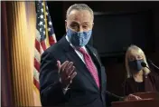  ?? JACQUELYN MARTIN — THE ASSOCIATED PRESS ?? Senate Majority Leader Chuck Schumer, D-N.Y., left, speaks during a news conference next to Sen. Patty Murray, D-Wash., Tuesday on Capitol Hill in Washington.