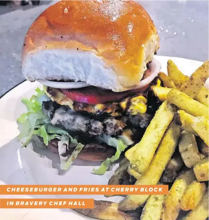  ?? Alison Cook / Staff ?? CHEESEBURG­ER AND FRIES AT CHERRY BLOCK
IN BRAVERY CHEF HALL