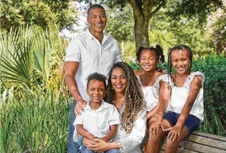  ?? Melissa Phillip / Staff photograph­er ?? Shannon LaNier and his wife, Chandra, have talked with children Carter, left, 4, McKenzie, 7, and Madison, 9, about their ancestry.