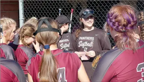  ?? Graham Thomas/Herald-Leader ?? Siloam Springs head softball coach Emily Grace Ruggeri talks to the Lady Panthers before their game against Huntsville on March 10 at La-Z-Boy Softball Complex.