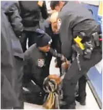  ??  ?? Scene from viral video shows cops yanking away child from Jazmine Headley. However, witness statements say the mom used tot as human shield to avoid arrest.