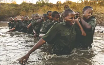  ?? BRENT STIRTON ?? A National Geographic Live-sponsored event at Jack Singer Concert Hall includes a discussion on Zimbabwe’s all-female anti-poaching unit, known as Akashinga (The Brave Ones). Vimbai Kumire, who is a member of the unit, will be on hand with recruiter and former Australian special operations sniper Damien Mander.