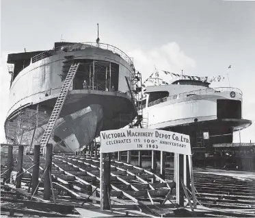  ??  ?? The Queen of Saanich and another B.C. ferry under constructi­on at the Victoria Machinery Depot in 1962.
