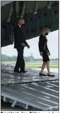  ?? (AP/Manuel Balce Ceneta) ?? President Joe Biden and first lady Jill Biden exit a military plane Sunday after a prayer during a casualty return at Dover Air Force Base in Delaware.