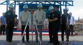  ??  ?? FLORIDABLA­NCA, PAMPANGA— Defense Secretary Delfin Lorenzana (second from left) and US Ambassador to the Philippine­s Sung Y. Kim (third from left) lead the groundbrea­king ceremony for a multipurpo­se Humanitari­an Defense Response Warehouse at Basa Air...