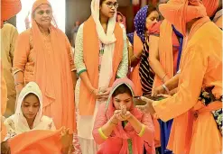  ?? — DC ?? Sikh devotees at the Ameerpet gurudwara perform rituals ahead of the 318th Khalsa Sajna Diwas, also known as Baisakhi.