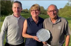  ?? ?? Heather Hardy and Bruce Maguire receive the Whitehead Salver from Canterbury GC captain Kenny Williamson