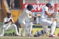  ??  ?? GOTCHA: Indian wicketkeep­er Parthiv Patel takes a catch to dismiss England’s captain Alastair Cook for 27