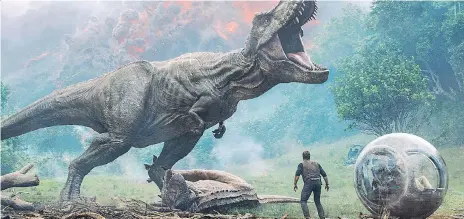  ?? PHOTOS: UNIVERSAL ?? In the latest Jurassic Park story, starring Chris Pratt and Bryce Dallas Howard, the dinosaurs in Fallen Kingdom — again threatened with extinction — are pursued by poachers and others who wish to capture and capitalize on an endangered if dangerous...