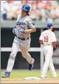  ?? Matt Slocum
Associated Press ?? ZACK GREINKE rounds the bases after hitting a home run.