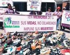  ?? Afp ?? PROTESTA. Mujeres en Tegucigalp­a demandan justicia por las 5,929 asesinadas en Honduras en los últimos 15 años.