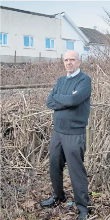  ?? Pictures: MATTHEW HORWOOD/ATHENA PICTURES ?? Robin Waistell next to the railway line among the Japanese knotweed that spread into the foundation­s of his home in south Wales