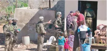  ?? Agence France-presse ?? Israeli security forces raid Kafr Al Dik village in West Bank on Tuesday.