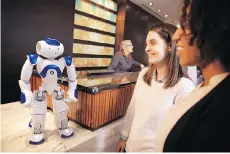  ?? HILTON WORLDWIDE ?? Concierge robot Connie will work side-by-side with Hilton’s human employees to help with visitor requests.