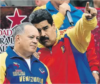  ?? Diosdado Cabello (vlevo) s prezidente­m Nicolásem Madurem. FOTO PROFIMEDIA ?? Kyj venezuelsk­é diktatury.