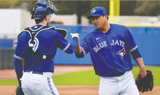  ?? DOUGLAS DEFELICE/USA TODAY SPORTS ?? Jays catcher Danny Jansen describes the team’s ace starter, Hyun-jin Ryu, as aggressive, smart and crafty. “He knows how to pitch,” Jansen says.