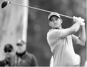  ?? — USA TODAY Sports ?? Sam Saunders hits from the ninth hole tee box during the first round of the Genesis Open golf tournament at Riviera Country Club.