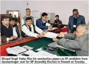  ??  ?? Shivpal Singh Yadav files his nomination papers as SP candidate from Jaswantnag­ar seat for UP Assembly Election in Etawah on Tuesday