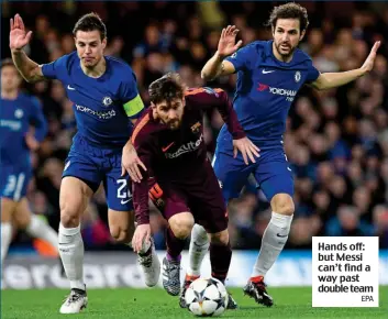  ?? EPA ?? Hands off: but Messi can’t find a way past double team
