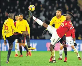  ??  ?? Manchester United's midfielder Paul Pogba kicks the ball during their English Premier League football match against Watford at Vicarage Road Stadium in Watford.